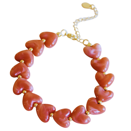 Kralenarmband hartjes roze