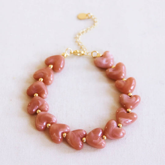 Kralenarmband hartjes roze
