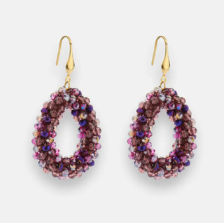 Statement oorbellen paars detailfoto van Joy & Clay